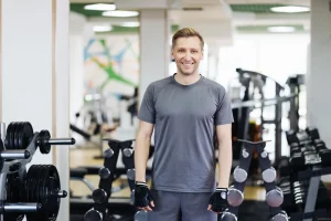 30 year old man working out in the gym